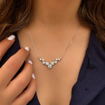 Sparkling white gold necklace - Nine zircon stones