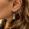 Sparkling white gold earrings - Five zircon stones