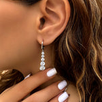 Sparkling white gold earrings - Five zircon stones