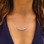 Sparkling white gold necklace - Nine zircon stones