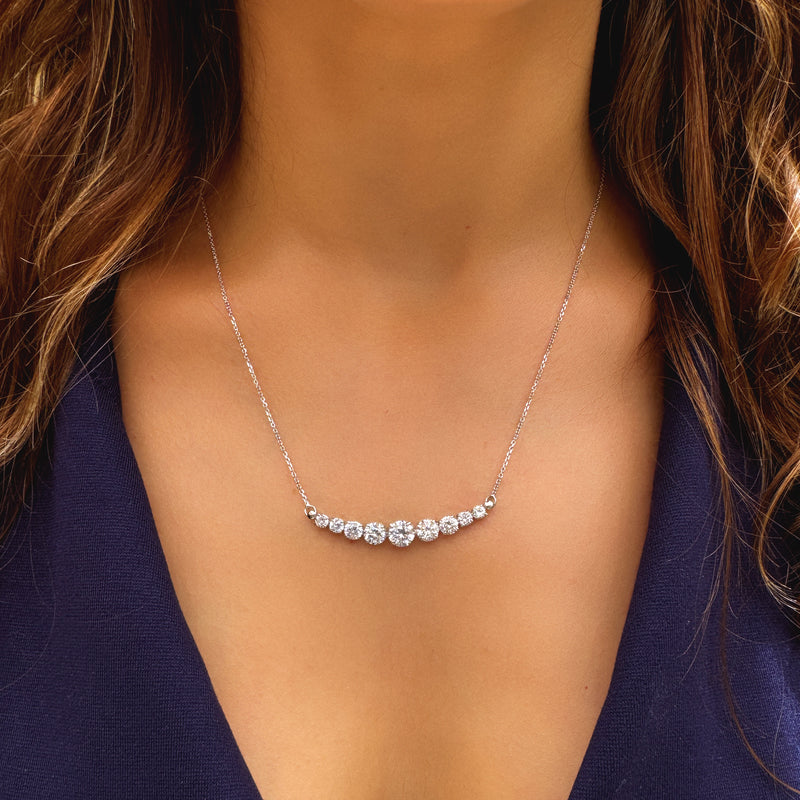 Sparkling white gold necklace - Nine zircon stones